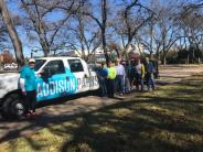 Group of volunteers in front of the Addison Parks truck