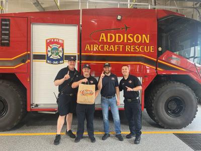 Addison Fire recieving Public Service Appreciation goodies.