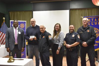 Rotary club presenting check to Addison first responders