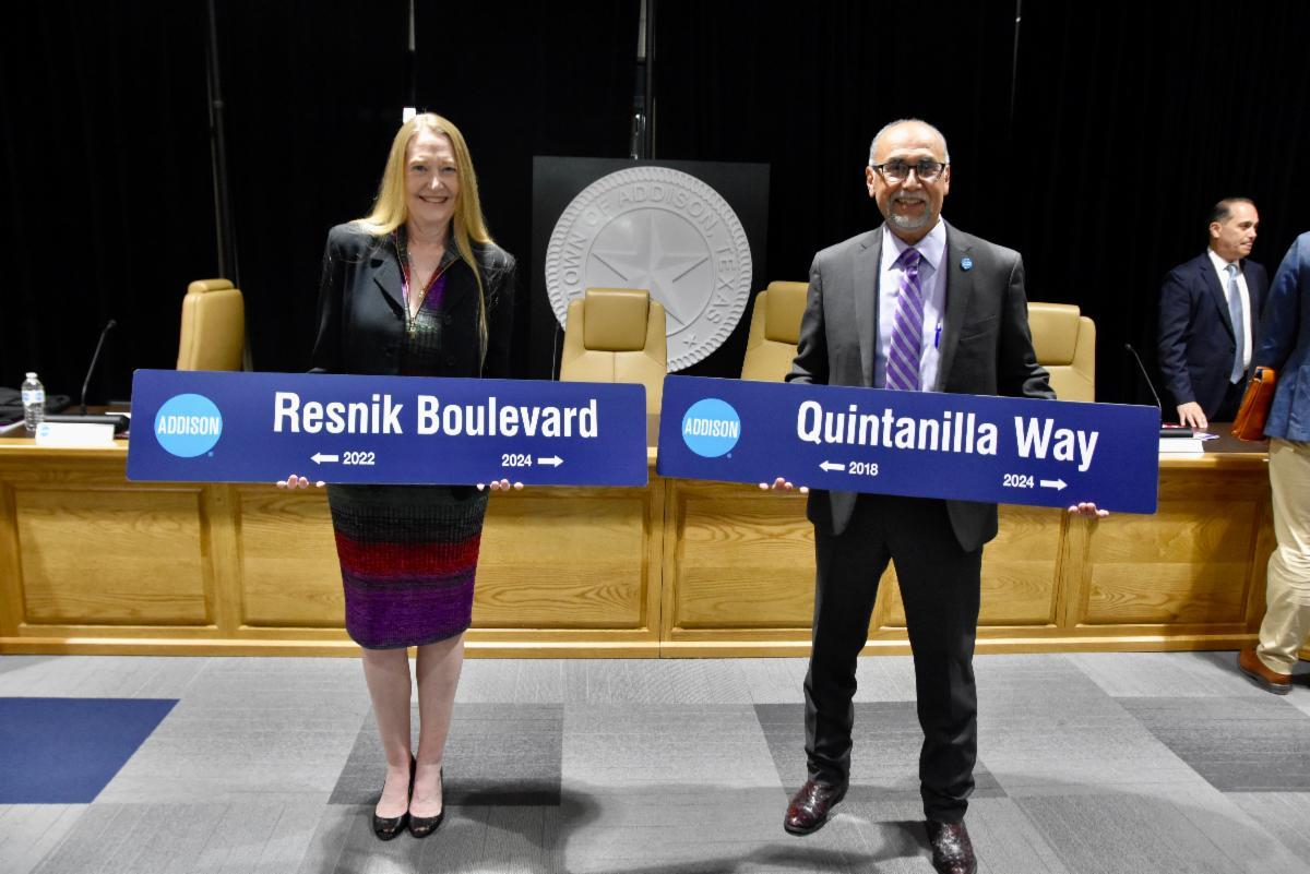 Resnik and Quintanilla with personalized street signs
