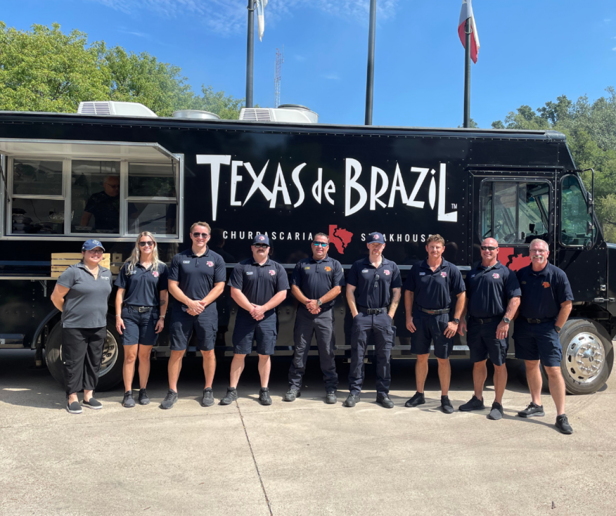 Fire Fighters in front of Texas de Brazil food truck