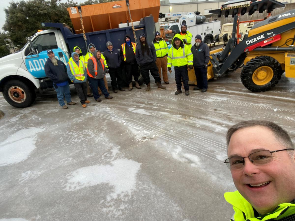 Group of Public Works workers in front of truck